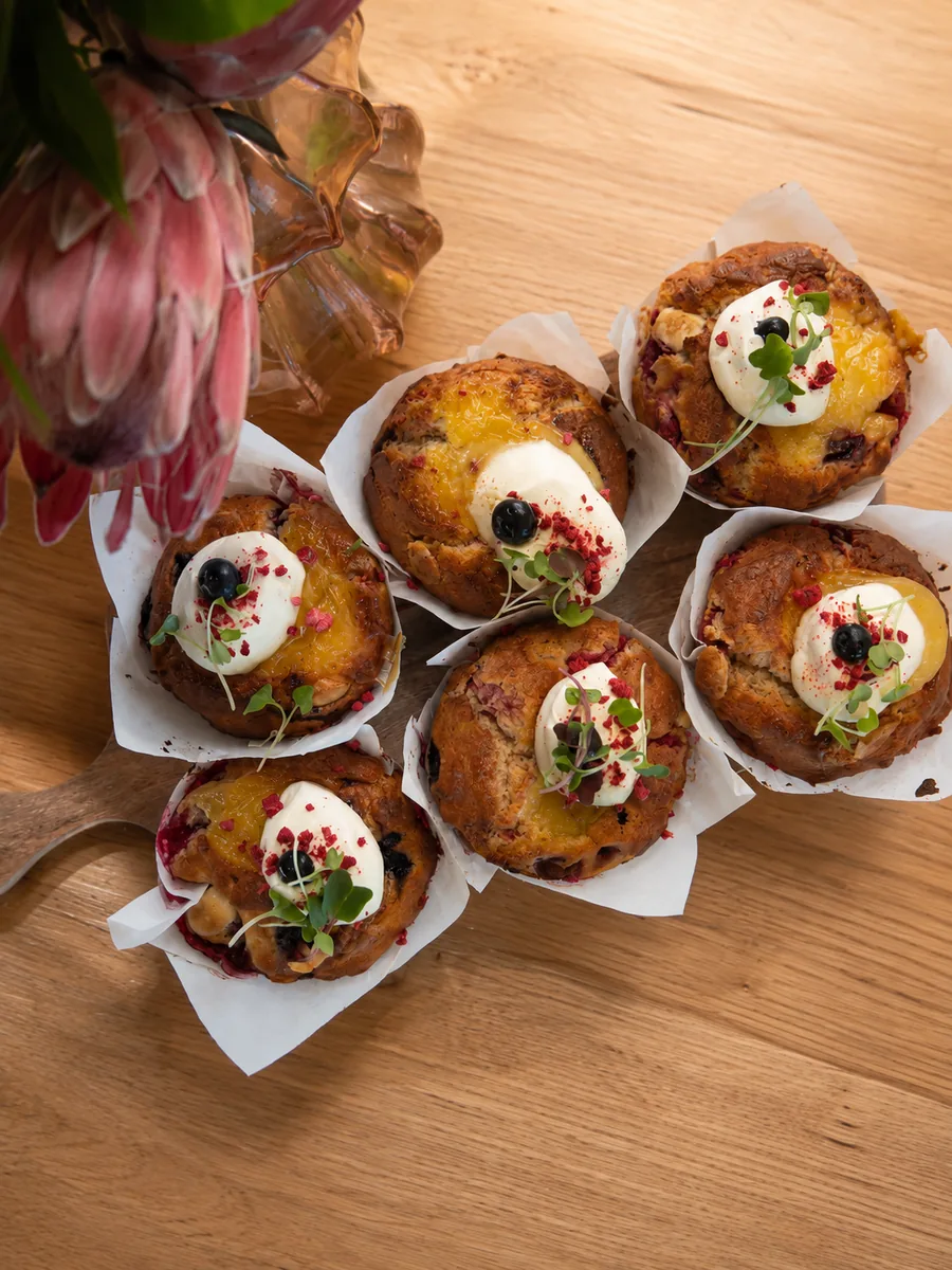 Sweet bakes topped with fruit and cream